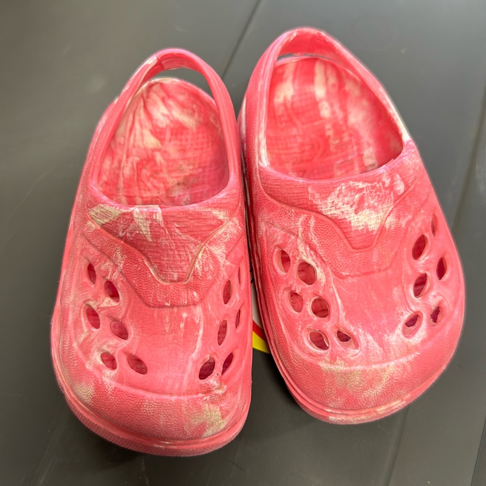 Pink croc-like sandals